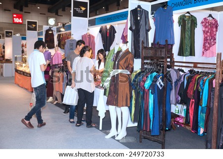 BANGKOK ,THAILAND - JANUARY 31: Unidentified people interest with silk cloth in Made in Thailand in Focus 2015, on January 31, 2015 in Bangkok, Thailand.