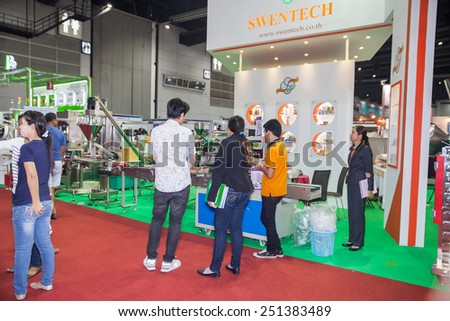 BANGKOK ,THAILAND - FEBRUARY 7:Unidentified people  interesting food packaging  machine At THAILAND Industrial Fair 2015 And Food  Pack Asia 2015 on February 7, 2015 in Bangkok,  Thailand.