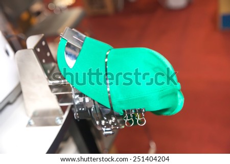BANGKOK ,THAILAND - FEBRUARY 7: Cap on embroidery machine at THAILAND  Industrial Fair 2015 And Food Pack Asia 2015 on February 7, 2015 in  Bangkok, Thailand.