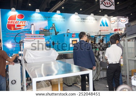 BANGKOK ,THAILAND - FEBRUARY 7: Unidentified people interesting  with bottle plastics maker at  THAILAND Industrial Fair 2015 And Food Pack Asia 2015 on  February 7, 2015 in Bangkok, Thailand.