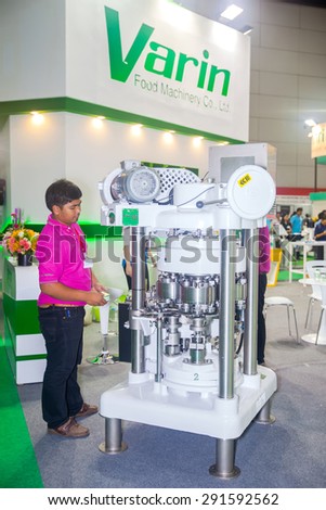 BANGKOK ,THAILAND - JUNE 20: Machinery maker food cans on work in 
PROPAK ASIA 2015, on JUNE 20, 2015 in Bangkok, Thailand.