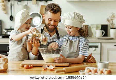 Similar – Image, Stock Photo Cheerful siblings mixing dough together in kitchen
