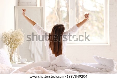 Similar – Image, Stock Photo Anonymous woman stretching body in seated forward bend position