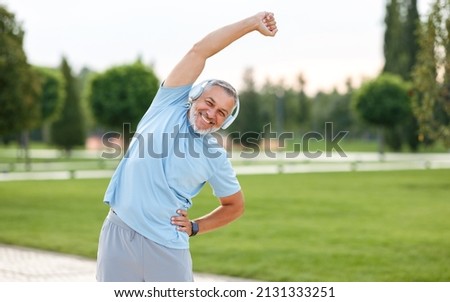 Similar – Image, Stock Photo Sportsman listening to music during workout