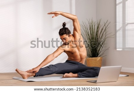 Similar – Image, Stock Photo Shirtless man doing yoga on terrace