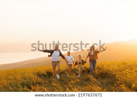 Similar – Image, Stock Photo happy young woman outdoors dancing and listening to music on mobile phone and headset. technology and lifestyle