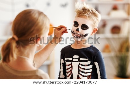 Similar – Image, Stock Photo Cheerful woman preparing paint during renovation