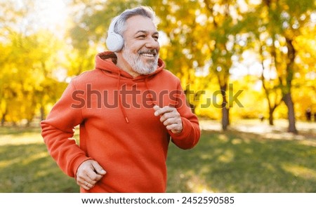 Similar – Image, Stock Photo An older man with a beard looks to the side tensely.