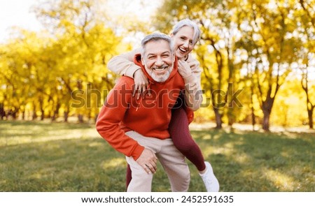 Similar – Image, Stock Photo happy couple in love at home. Afro american woman and caucasian man using laptop. ethnic love concept