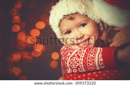 Christmas magic  a woman happy family mother and Child