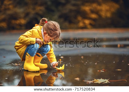 Similar – Image, Stock Photo Child with rubber boots swinging in garden