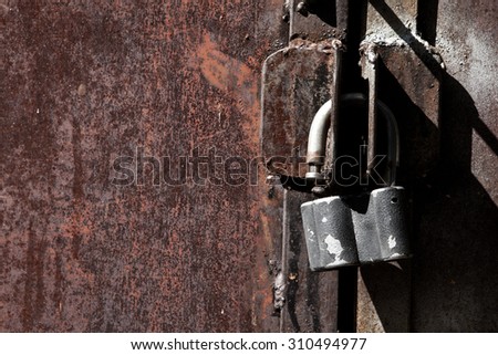 Rusty iron unlock gates for design and texture background