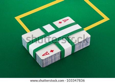 Deck of cards on poker table