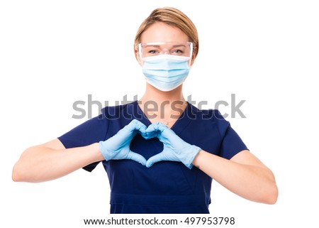 Female Doctor Nurse dental hygienist making heart shape over her heart isolated on white background for use alone or as a design element Stockfoto © 