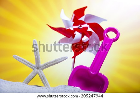 Toy windmill and beach accesories