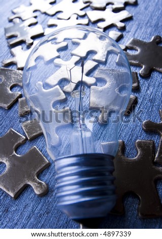 Light bulb on jigsaws