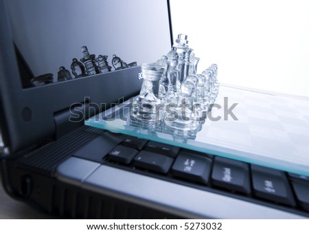 Glass chess & Laptop
