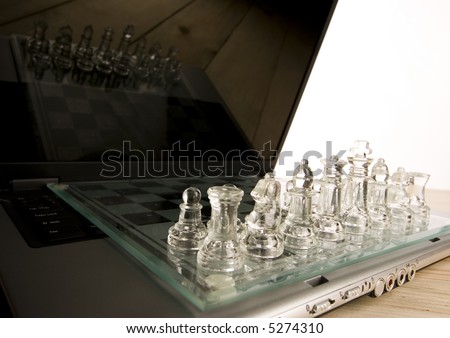 Glass chess & Laptop