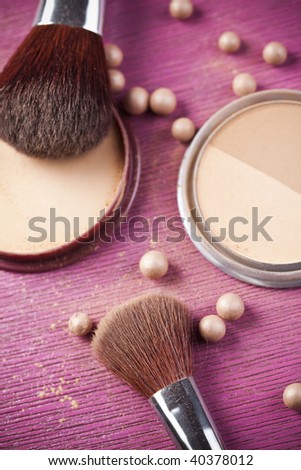Face powder, make up and brushes