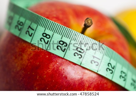 Apple and measurement tape
