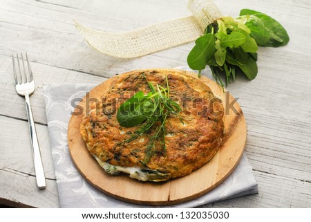 herbs mix omelet over white wood