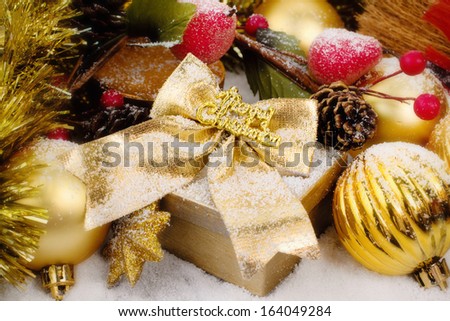 christmas package with golden decorations