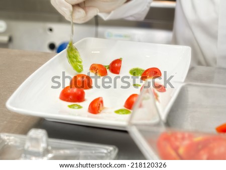 food composition with chef hands