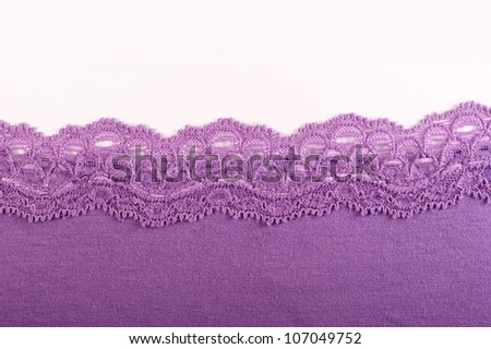 purple fabric with lace on a white background