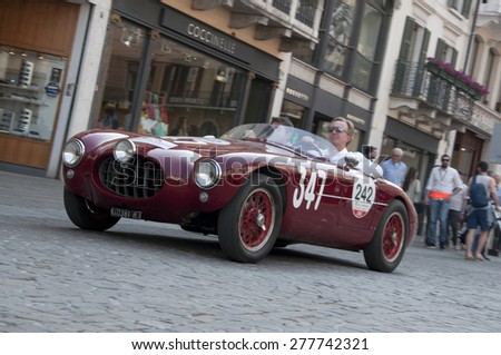 BRESCIA,ITALY - MAY,13:Registration of participants of the famous race retro cars Mille Miglia, May 13,2015 in Brescia,Italy. Driver Jamie Constable on ERMINI Gilco 1100 Motto, 1952 built