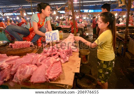 VIENTIANE, LAOS - MARCH 5: Unidentified people selling food at Talat Sao on March 5, 2014 in Vientiane, Laos