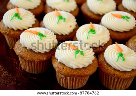 carrot cake cupcakes on fall party plate