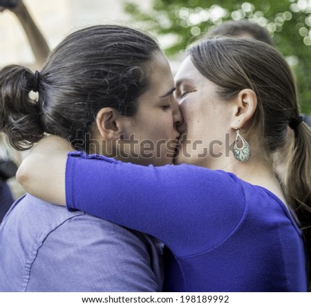MADISON, WISCONSIN USA - JUNE 6: A lesbian couple getting married on the steps of the City County Building after a judge struck down Wisconsin\'s gay marriage ban on Friday June 6, 2014 in Madison, WI