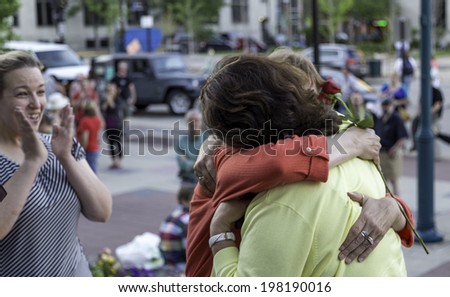MADISON, WISCONSIN USA - JUNE 6: A lesbian couple getting married on the steps of the City County Building after a judge struck down Wisconsin\'s gay marriage ban on Friday June 6, 2014 in Madison, WI