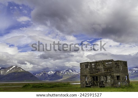 ICELAND - JULY 4, 2014: An abandoned house falling into ruin in rural south Iceland.  Many people have abandoned rural areas for Reykjavik.
