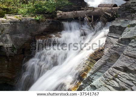 A beautiful waterfall in Glacier National Park, Montana