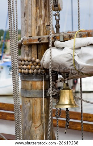 sail equipment - ropes, bell, mast, deck of sailboat yacht.
