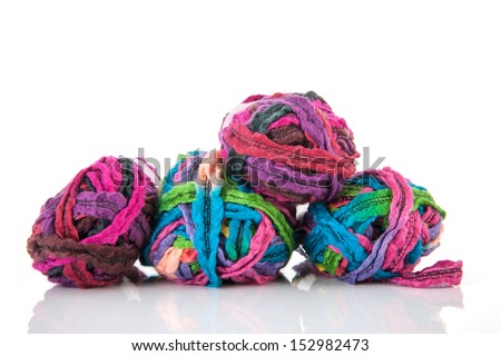 Balls colorful knitting wool isolated over white background