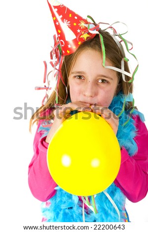  Little girl is blowing a balloon at her birthday Foto stock © 
