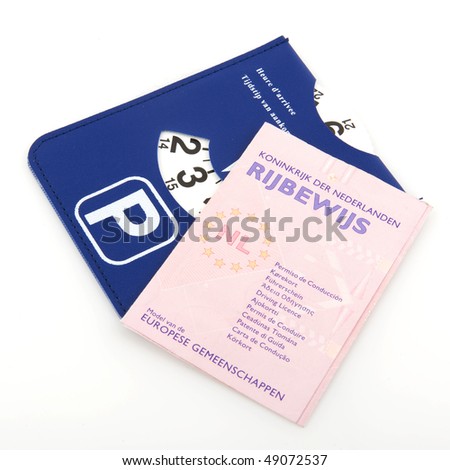 Dutch driver license and parking card on white background