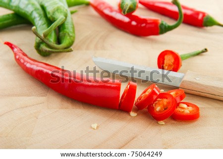 Cut green and red hot chili peppers