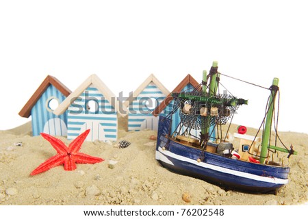 Little fisherman village with houses and boat