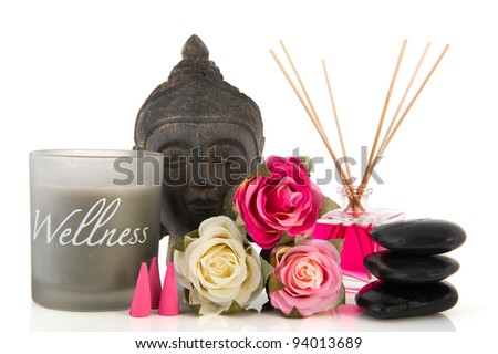 Wellness set with roses hot stones and buddha