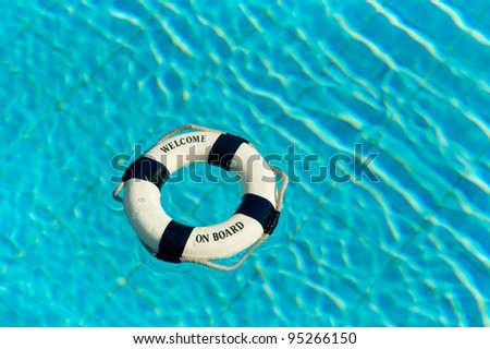 Welcome on board with life buoy in swimming pool