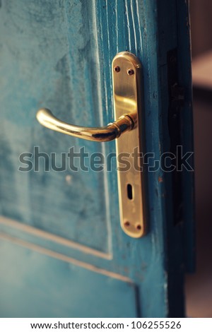 Door opening in a  room, handle close up