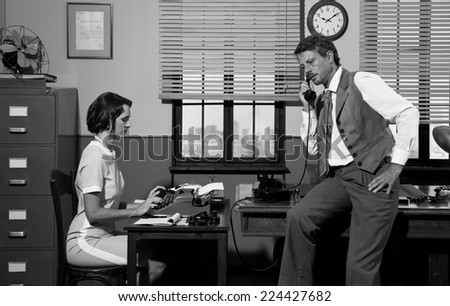 Vintage young secretary and confident director working in the office.