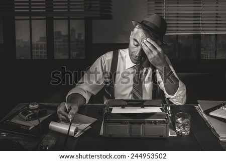 Professional reporter working late at night at his desk with vintage typewriter, 1950s style.