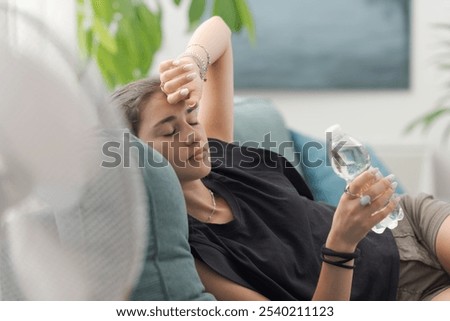 Similar – Image, Stock Photo Young woman resting during training after jogging