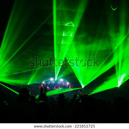 bright laser show in the crowd of merry men