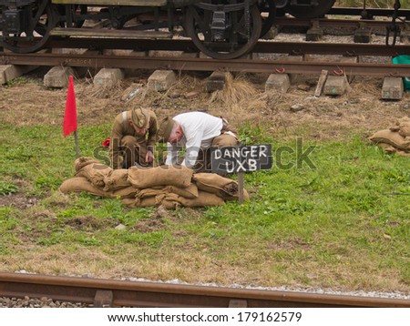 YORKSHIRE, UK - SEPT 14 Re-enactment of bomb disposal at Bolton Abbey steam railway, Yorkshire, UK, 14th September 2013, 1940\'s Weekend.