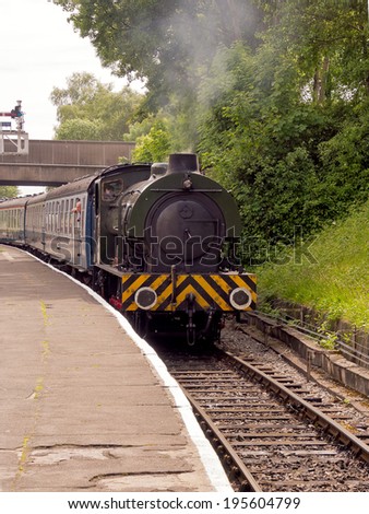 Bury, Lancashire, UK. 26th May 2014. Steam train arriving at the station at East Lancashire 40\'s weekend, Lancashire, UK